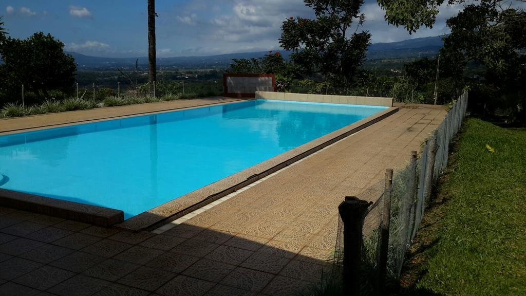 Hotel Cabinas Lindo Horizonte à San Pedro de Poas Extérieur photo